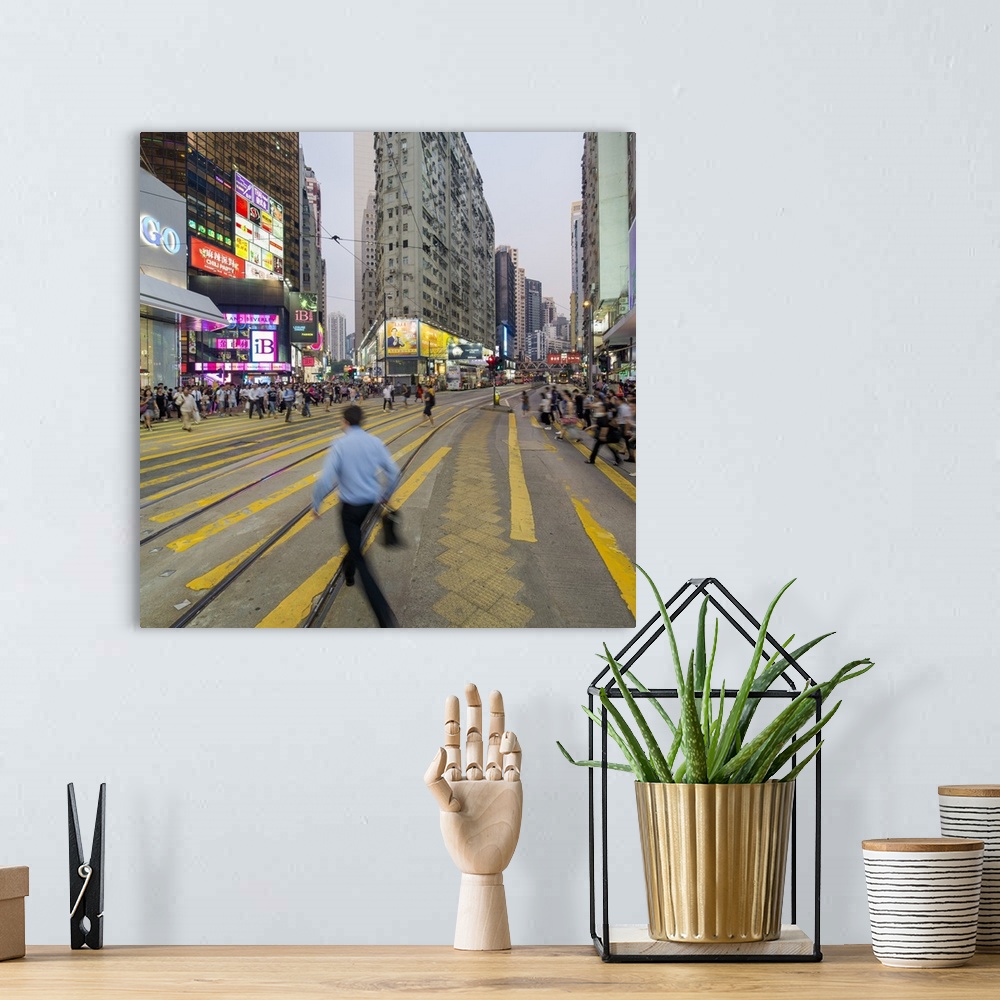 A bohemian room featuring Pedestrians and traffic at a busy road crossing in Causeway Bay, Hong Kong Island, Hong Kong, China
