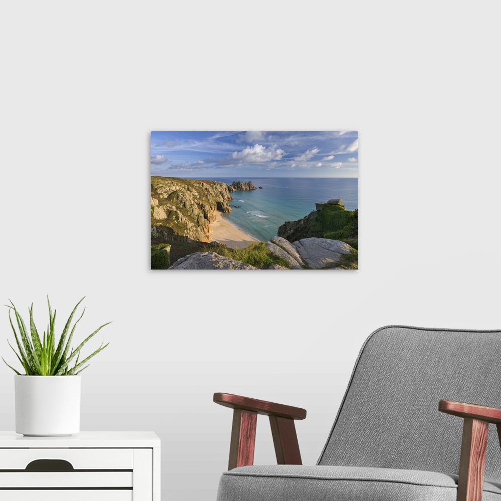 A modern room featuring Pednvounder beach and Logan Rock from Treen Cliff, Cornwall, England.