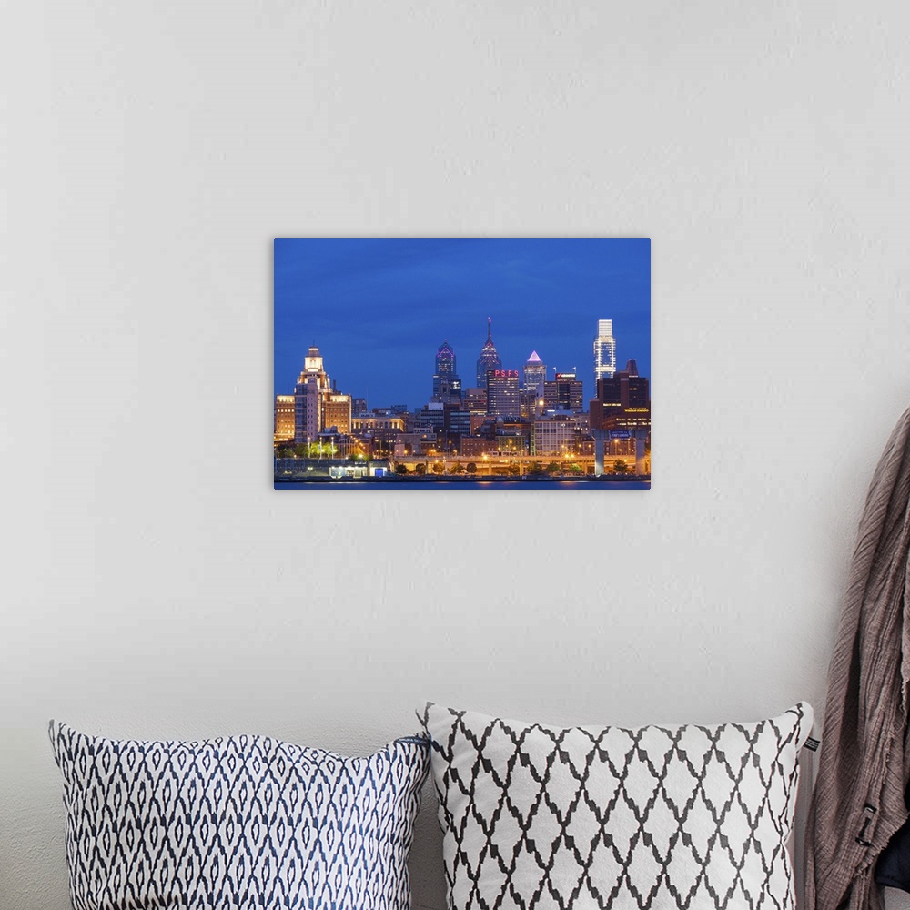 A bohemian room featuring USA, Pennsylvania, Philadelphia, city skyline from Camden New Jersey, dawn