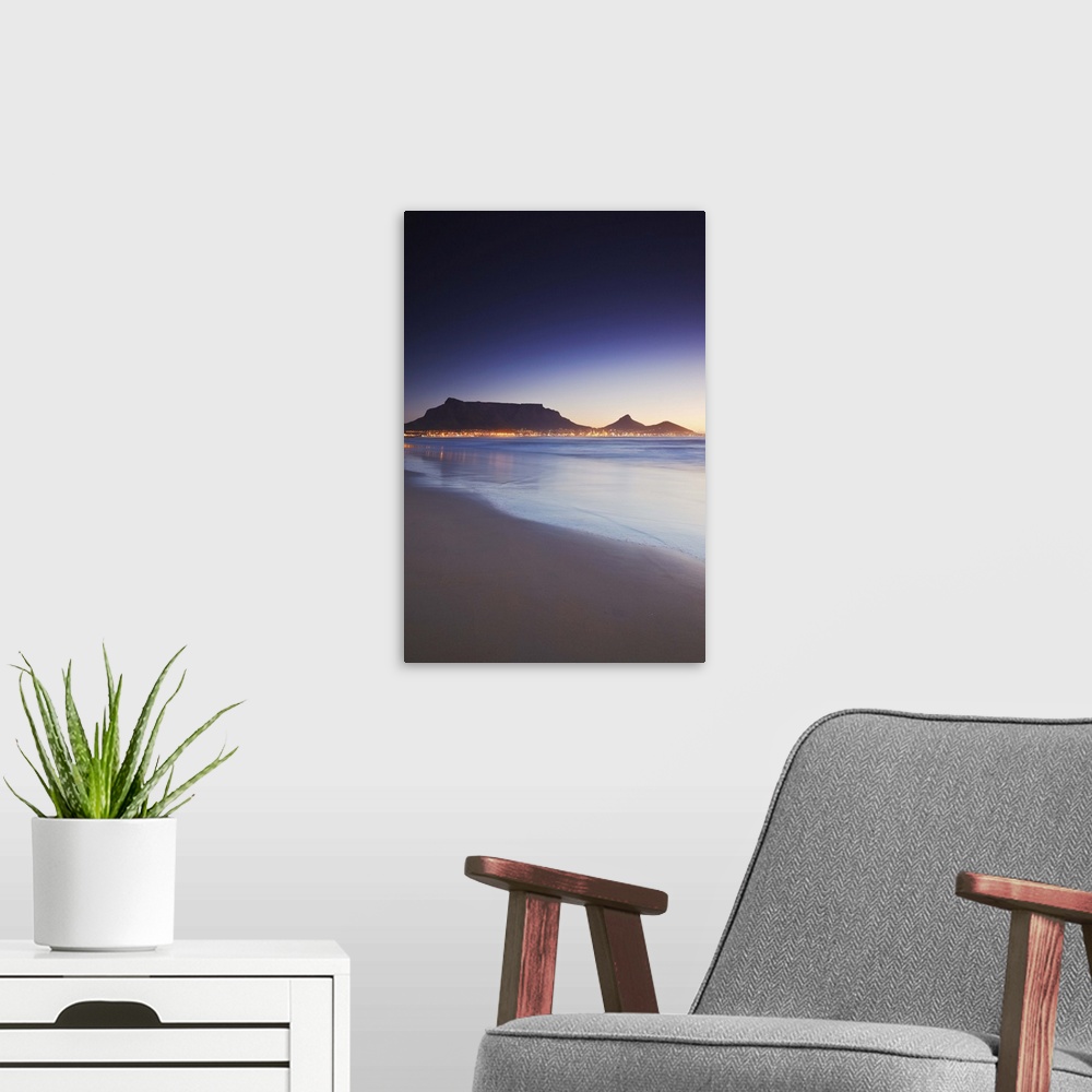 A modern room featuring View of Table Mountain at sunset from Milnerton beach, Cape Town, Western Cape, South Africa