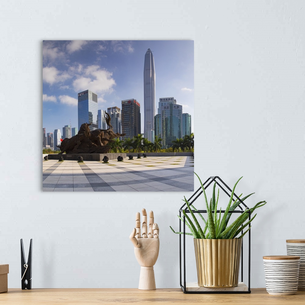 A bohemian room featuring Ping An International Finance Centre (world's 4th tallest building in 2017 at 600m) and sculpture...