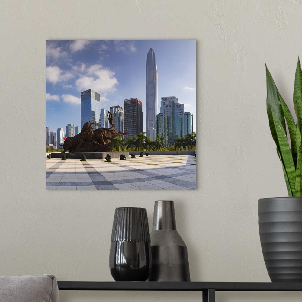 A modern room featuring Ping An International Finance Centre (world's 4th tallest building in 2017 at 600m) and sculpture...