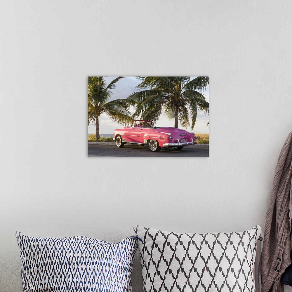 A bohemian room featuring Pink Chevrolet, Havana, Cuba.