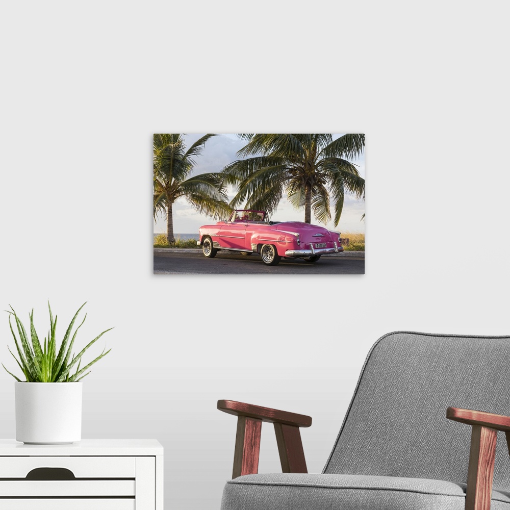 A modern room featuring Pink Chevrolet, Havana, Cuba.