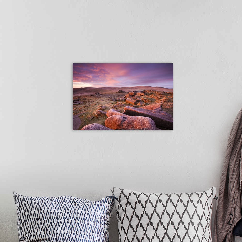 A bohemian room featuring Pink dawn sky above Belstone Tor, looking towards Higher Tor and Winter Tor in the mid distance a...