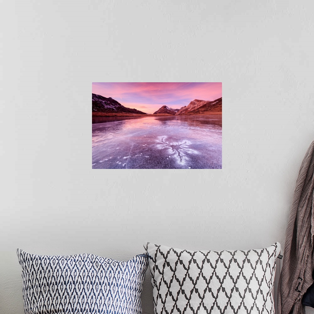 A bohemian room featuring Pink sky at sunset frames the frozen surface of Lej Nair Bernina Pass Canton of Graubunden Engadi...