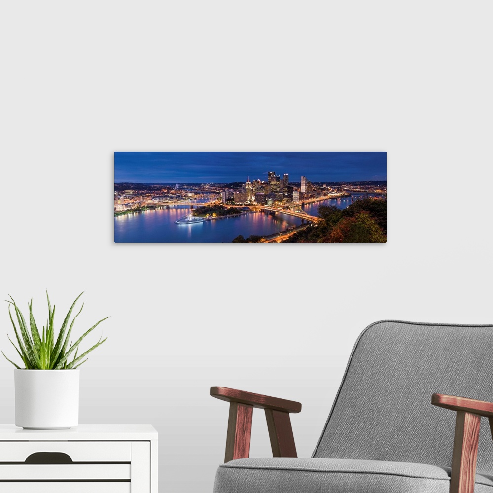 A modern room featuring Pittsburgh Skyline At Night, Pennsylvania, USA