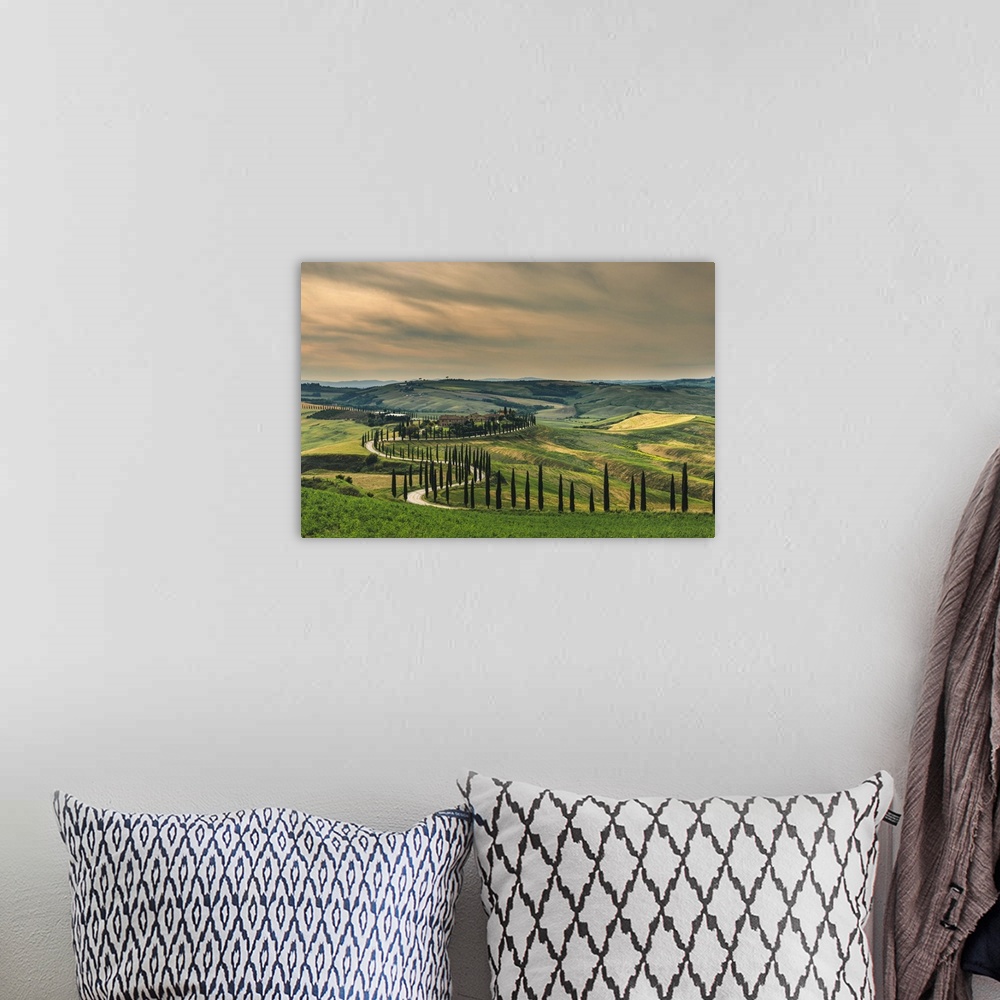 A bohemian room featuring Podere Baccoleno in spring during a hazy afternoon, Crete Senesi, Tuscany, Italy