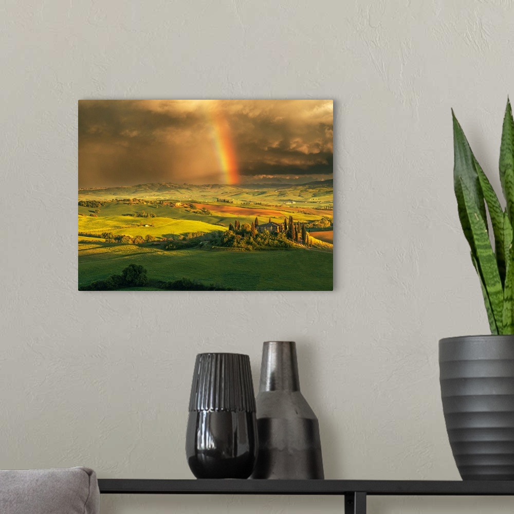 A modern room featuring Podere Belvedere after a storm with rainbow, Val d'Orcia, Tuscany, Italy