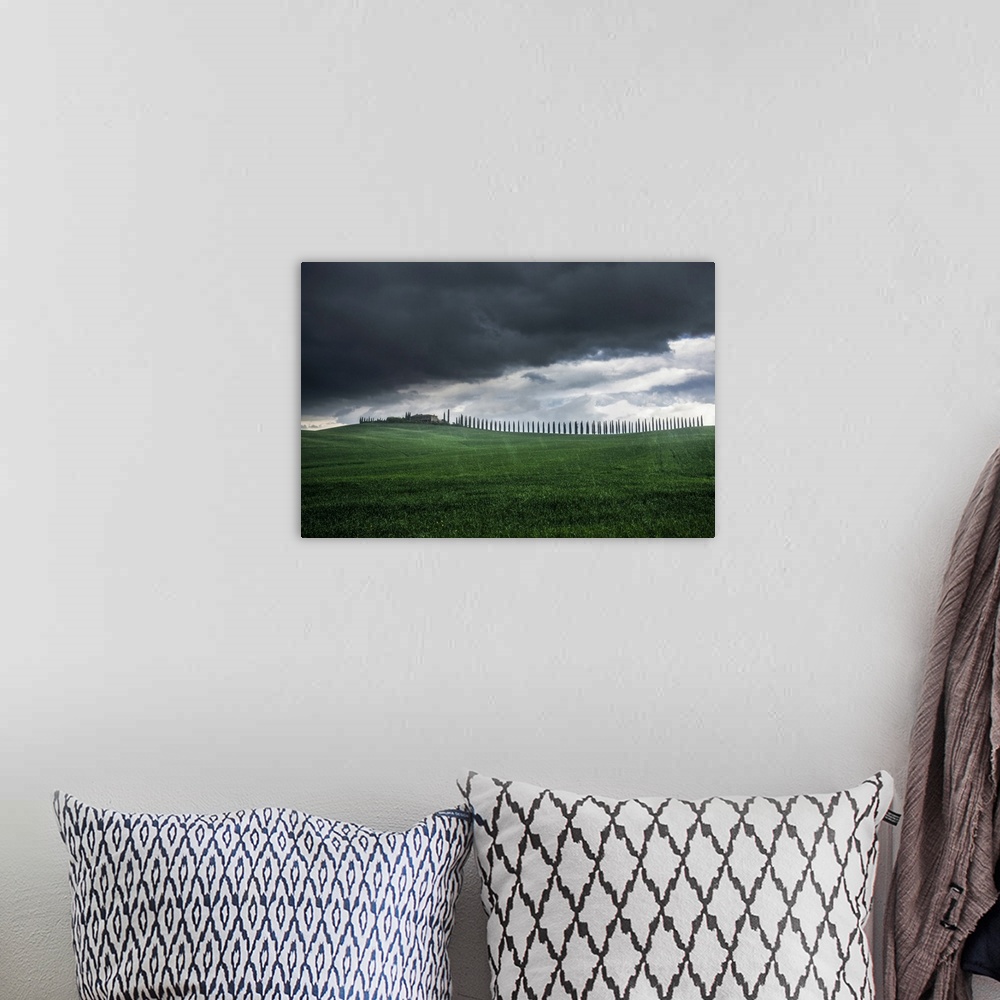 A bohemian room featuring Poggio Covili during a spring storm, Val d'Orcia, Tuscany, Italy