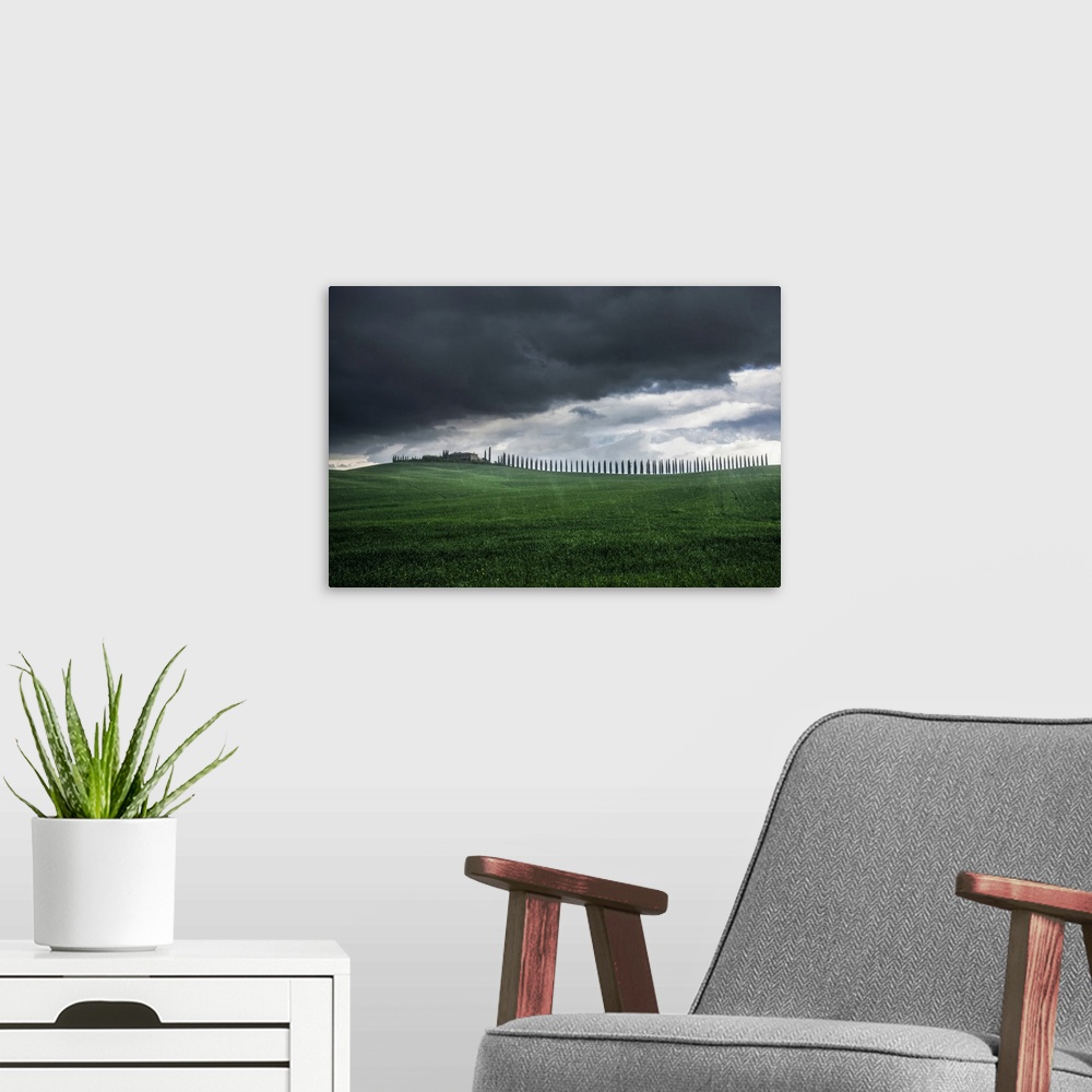 A modern room featuring Poggio Covili during a spring storm, Val d'Orcia, Tuscany, Italy