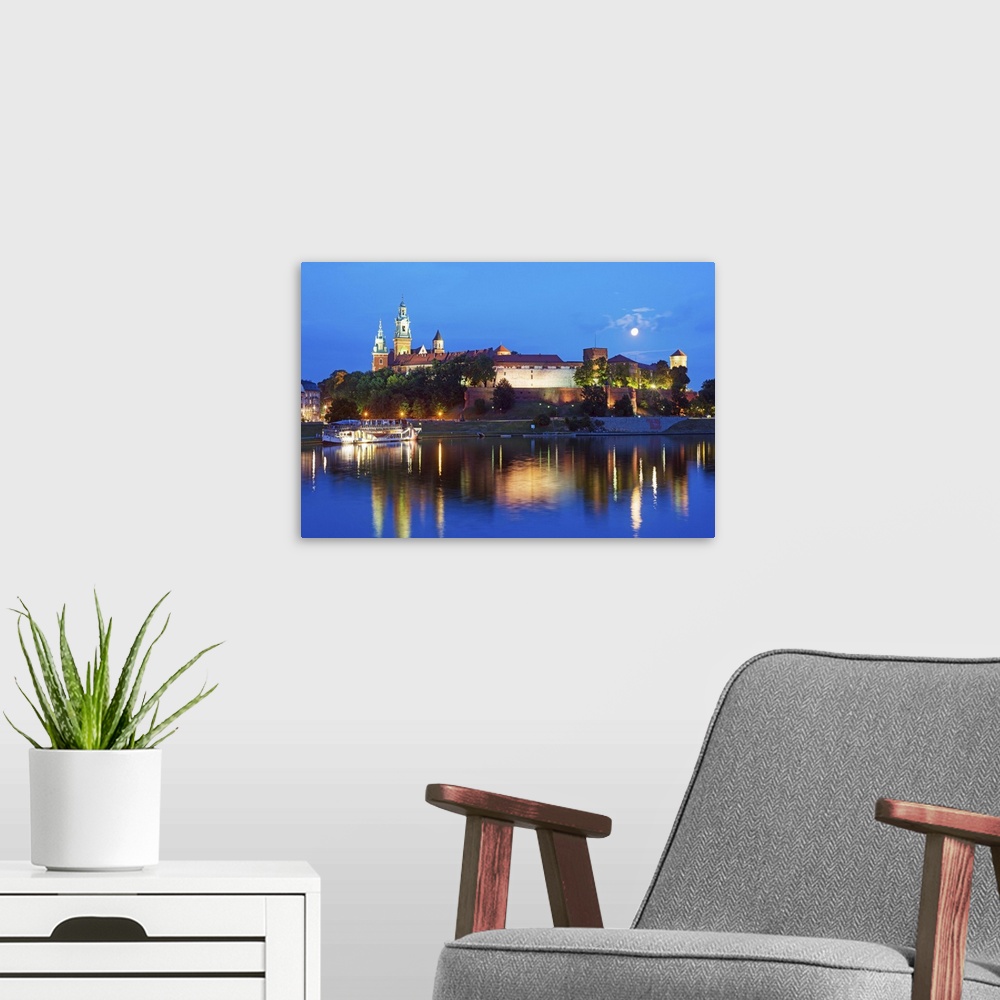 A modern room featuring Europe, Poland, Malopolska, Krakow, full moon over Wawel Hill Castle and Cathedral, Vistula River...
