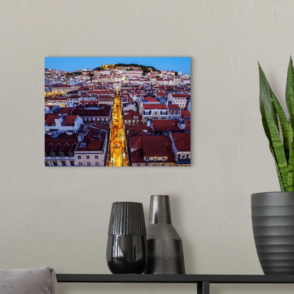 A modern room featuring Portugal, Lisbon, Miradouro de Santa Justa, Twilight view over downtown and Santa Justa Street to...