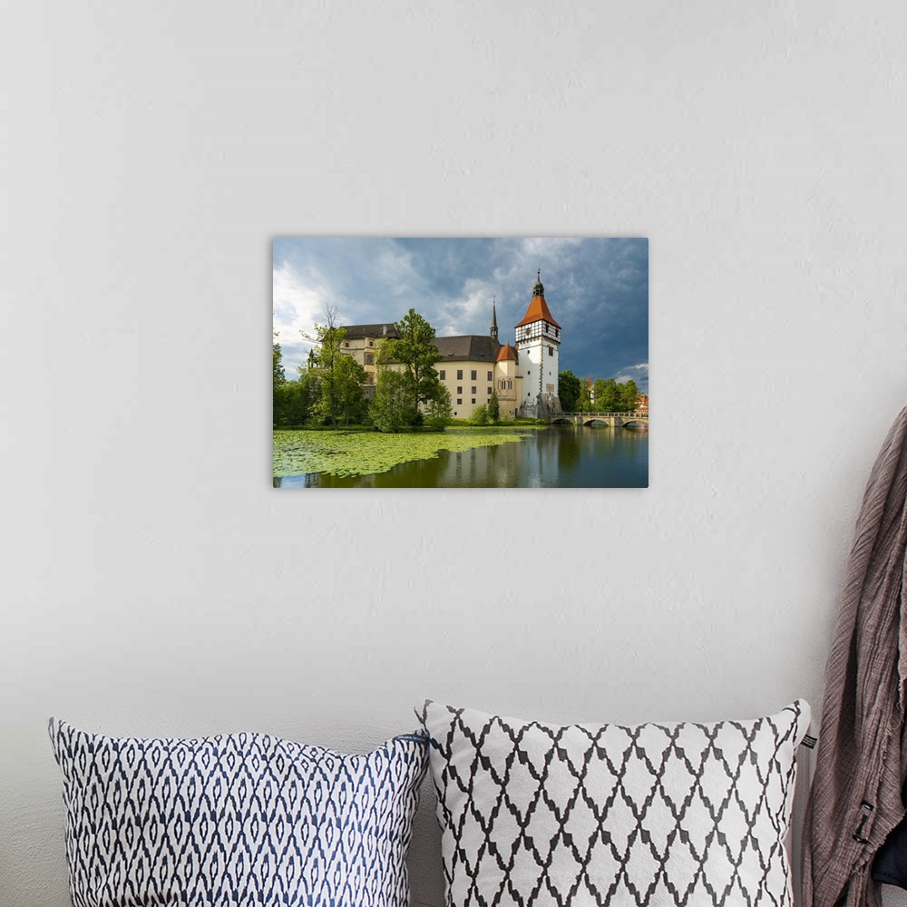 A bohemian room featuring Reflection of Blatna Castle in pond, Blatna, Strakonice District, South Bohemian Region, Czech Re...