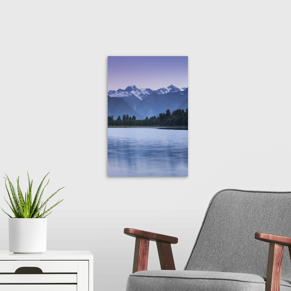 A modern room featuring New Zealand, South Island, West Coast, Fox Glacier Village, Lake Matheson, reflection of Mt. Tasm...