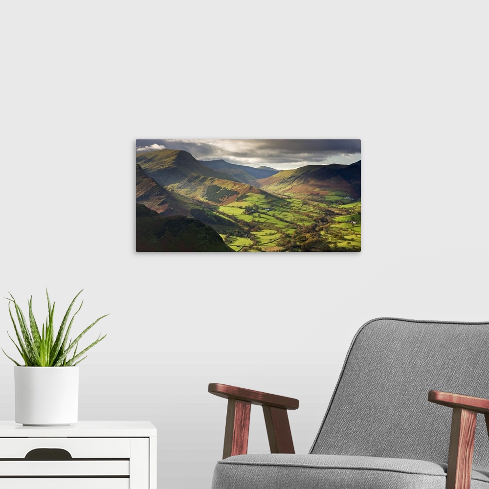 A modern room featuring Rich autumn sunlight illuminates Newlands Valley in the Lake District, Cumbria, England.