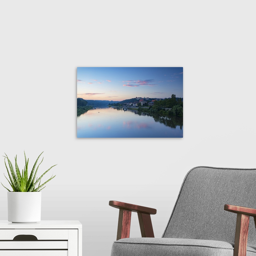 A modern room featuring View of River Elbe and Pirna at dawn, Saxony, Germany.