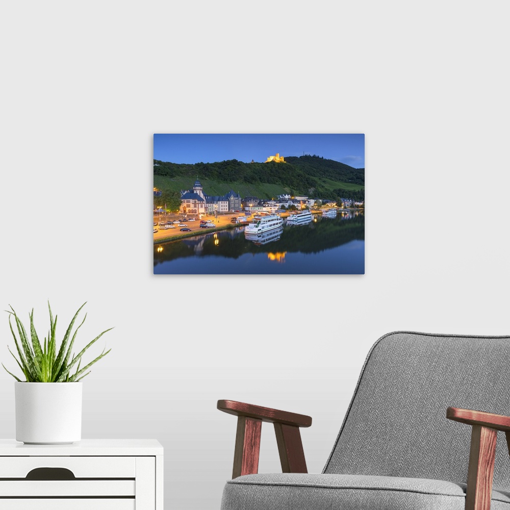 A modern room featuring View of River Moselle and Bernkastel-Kues at dusk, Rhineland-Palatinate, Germany.