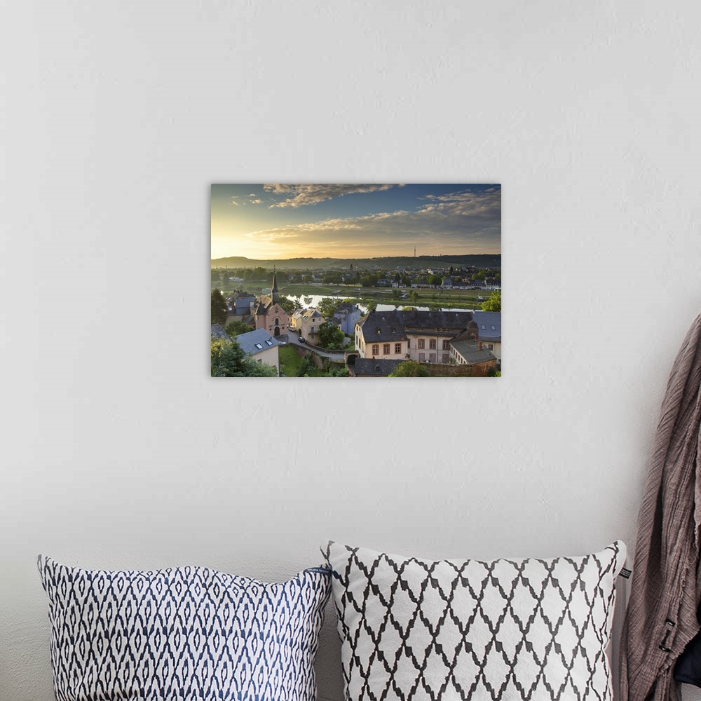 A bohemian room featuring View of River Moselle and skyline at dawn, Trier, Rhineland-Palatinate, Germany.