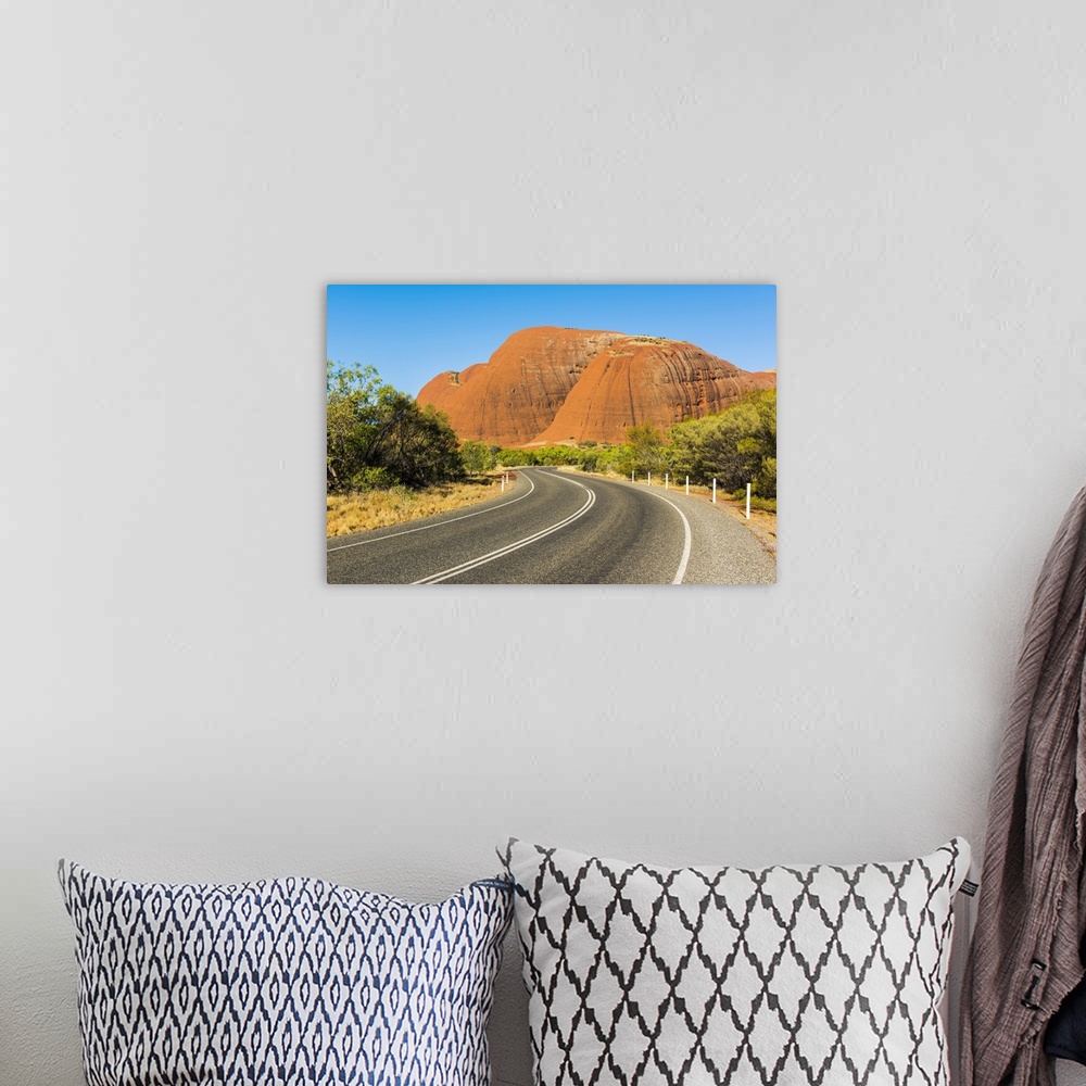 A bohemian room featuring Uluru-Kata Tjuta National Park, Northern Territory, Central Australia, Australia. Road leading to...