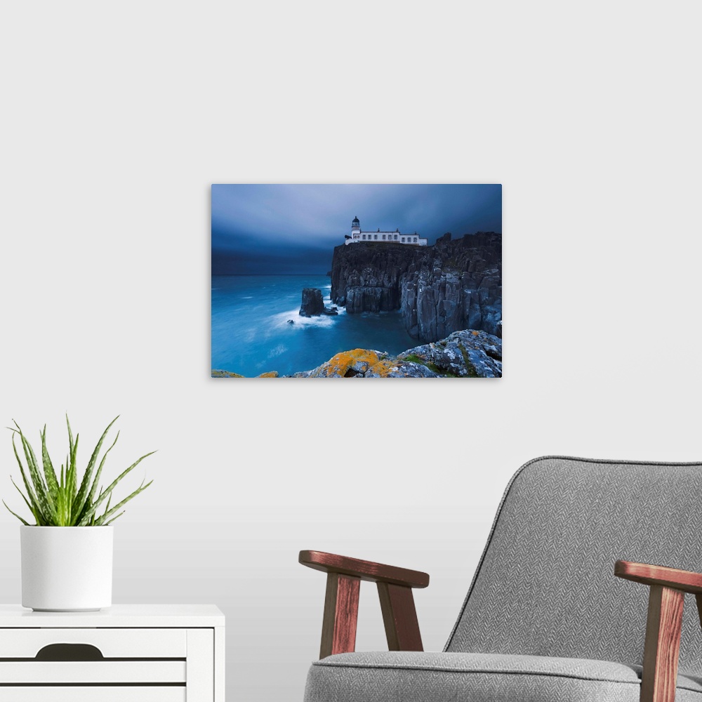 A modern room featuring Rocky cliff on the sea, with a lighthouse on the reef, Neist Point, Isle of Skye, Scotland, UK.