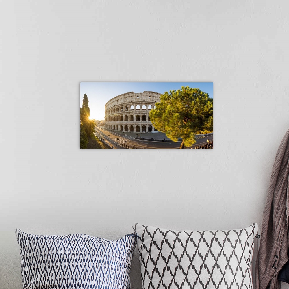 A bohemian room featuring Rome, Lazio, Italy. High angle panoramic view over the Colosseum square at sunrise.