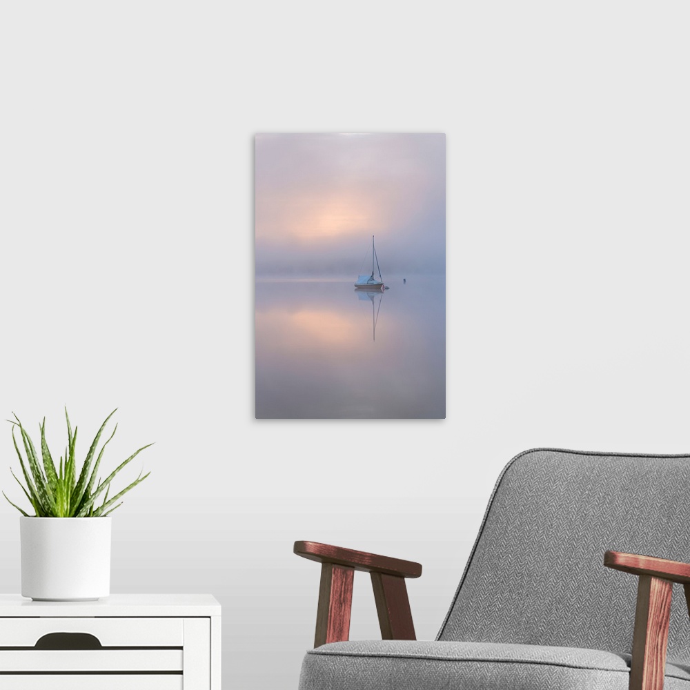 A modern room featuring Sailing boat in misty conditions at dawn on a reflective Wimbleball Lake, Exmoor National Park, S...