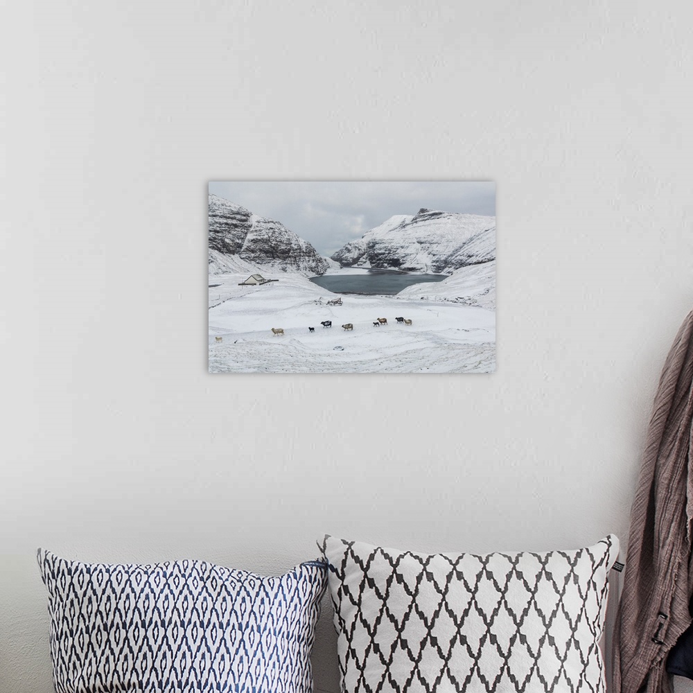 A bohemian room featuring Saksun covered by snow in the mid of May. Streymoy, Faroe Islands