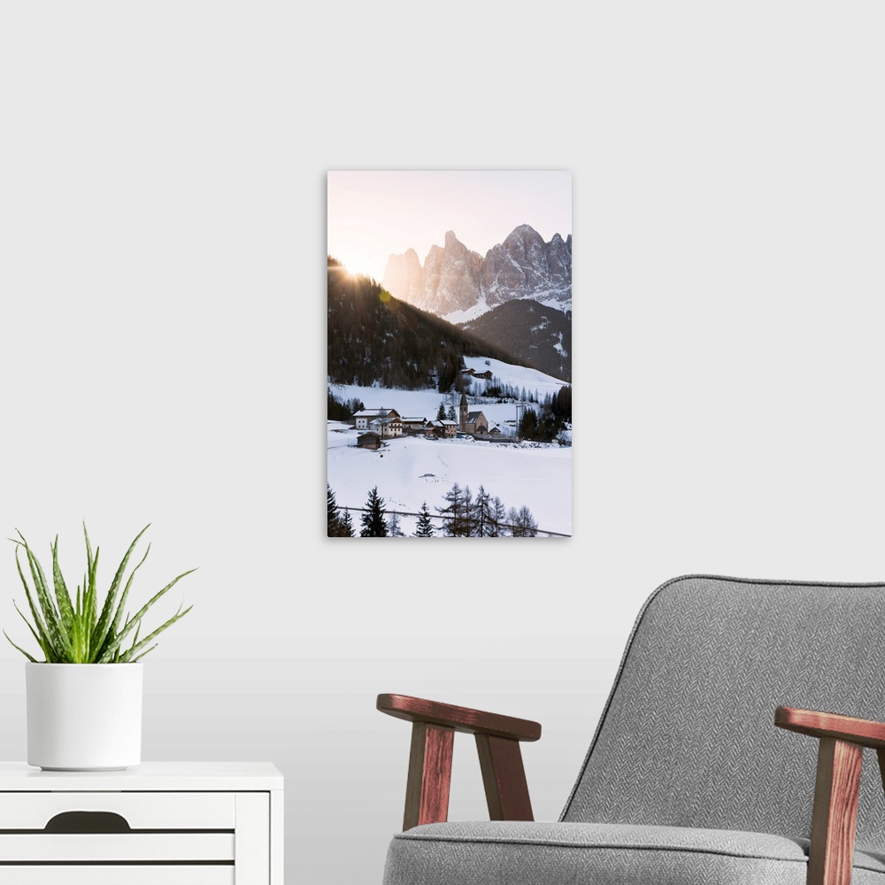 A modern room featuring Sankt Magdalena in a winter sunrise in Funes valley, Odle Natural park in Trentino Alto Adige dis...