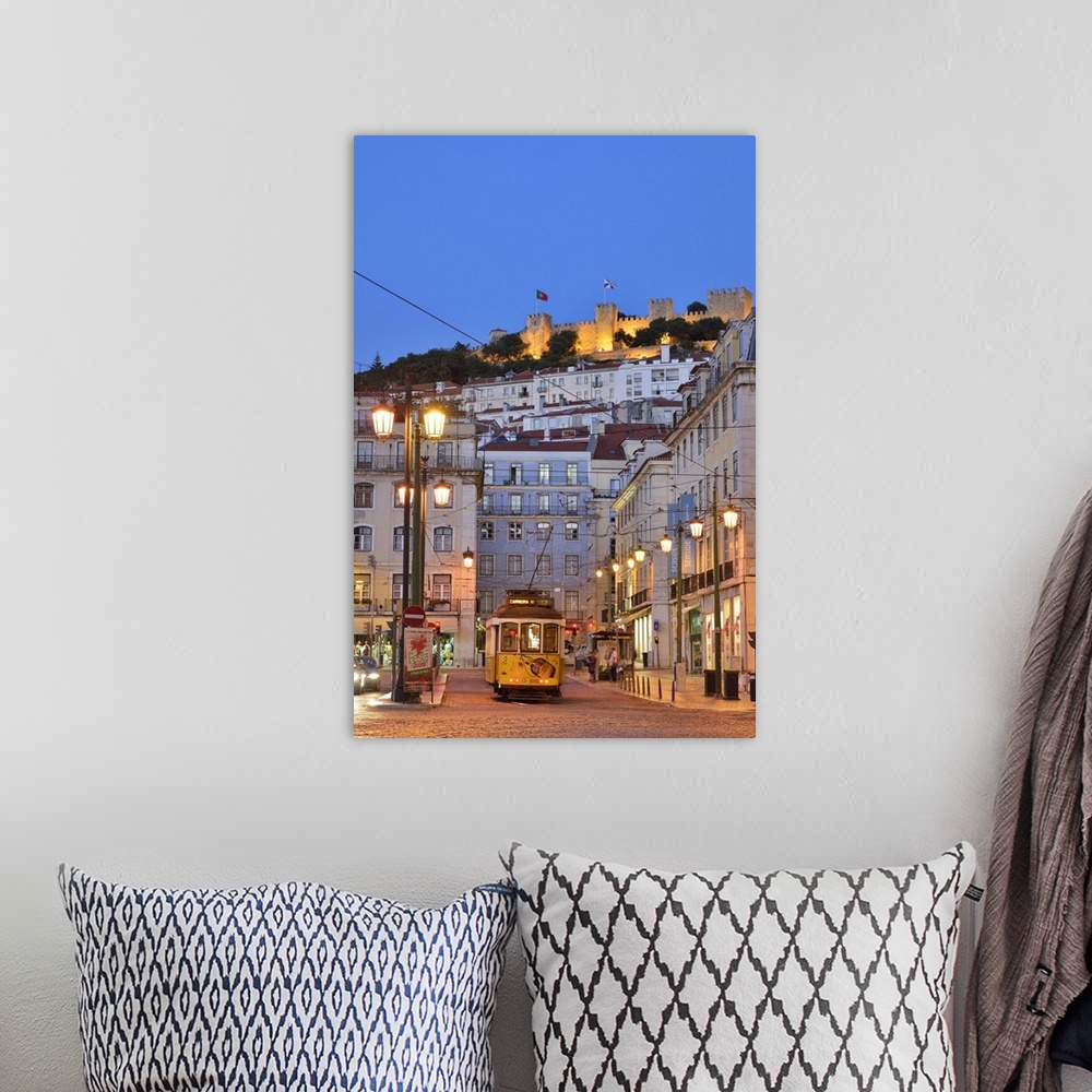 A bohemian room featuring Sao Jorge castle and Praca da Figueira at the historic centre of Lisbon. Portugal