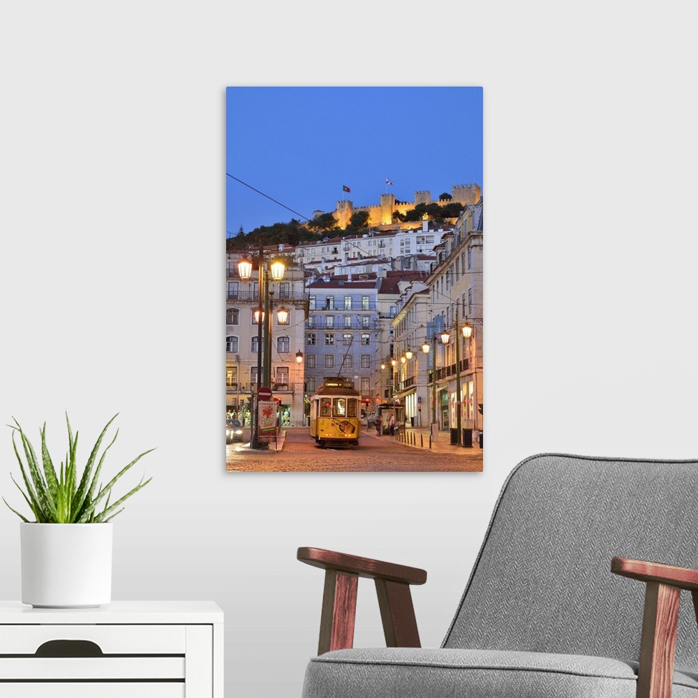 A modern room featuring Sao Jorge castle and Praca da Figueira at the historic centre of Lisbon. Portugal