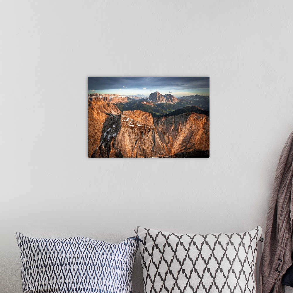 A bohemian room featuring Aerial view of Sassolungo group, Sassopiatto, Sella, Gardena Valley and Seceda at sunset, Dolomit...