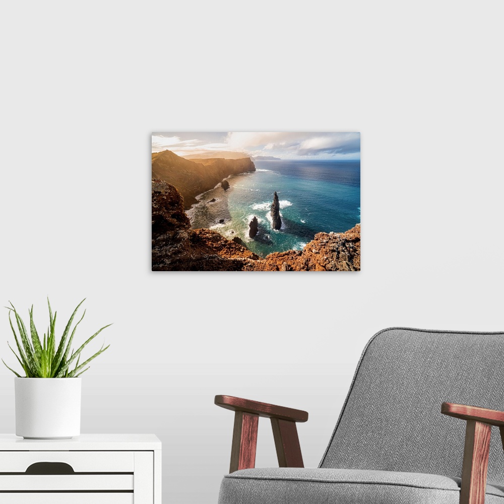 A modern room featuring The rocks, the sea and the cliff at sunset above the miradouro do San Lourenco, Madeira Island, P...