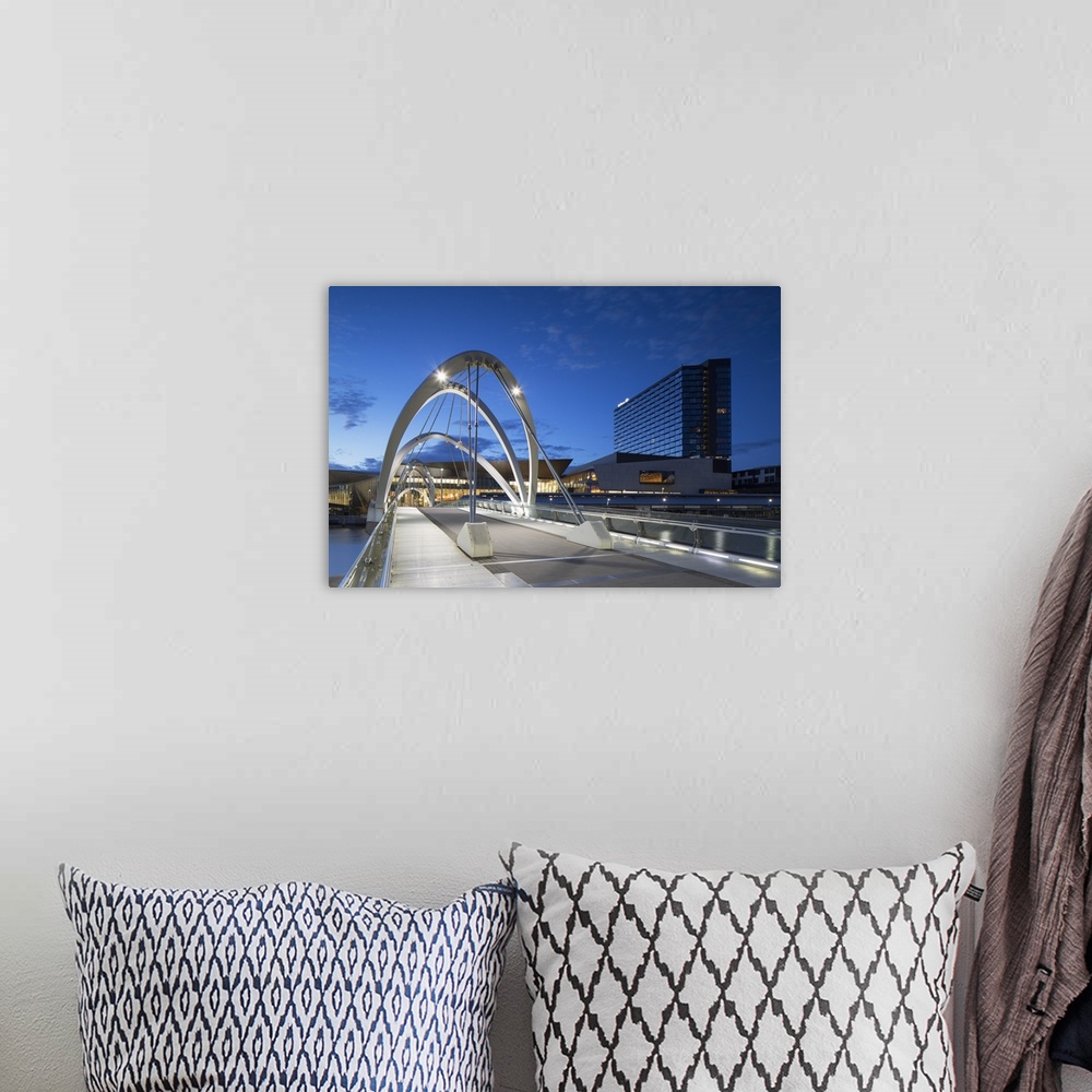 A bohemian room featuring Seafarers Bridge, Convention Centre and Hilton Hotel at dawn, Melbourne, Victoria, Australia.
