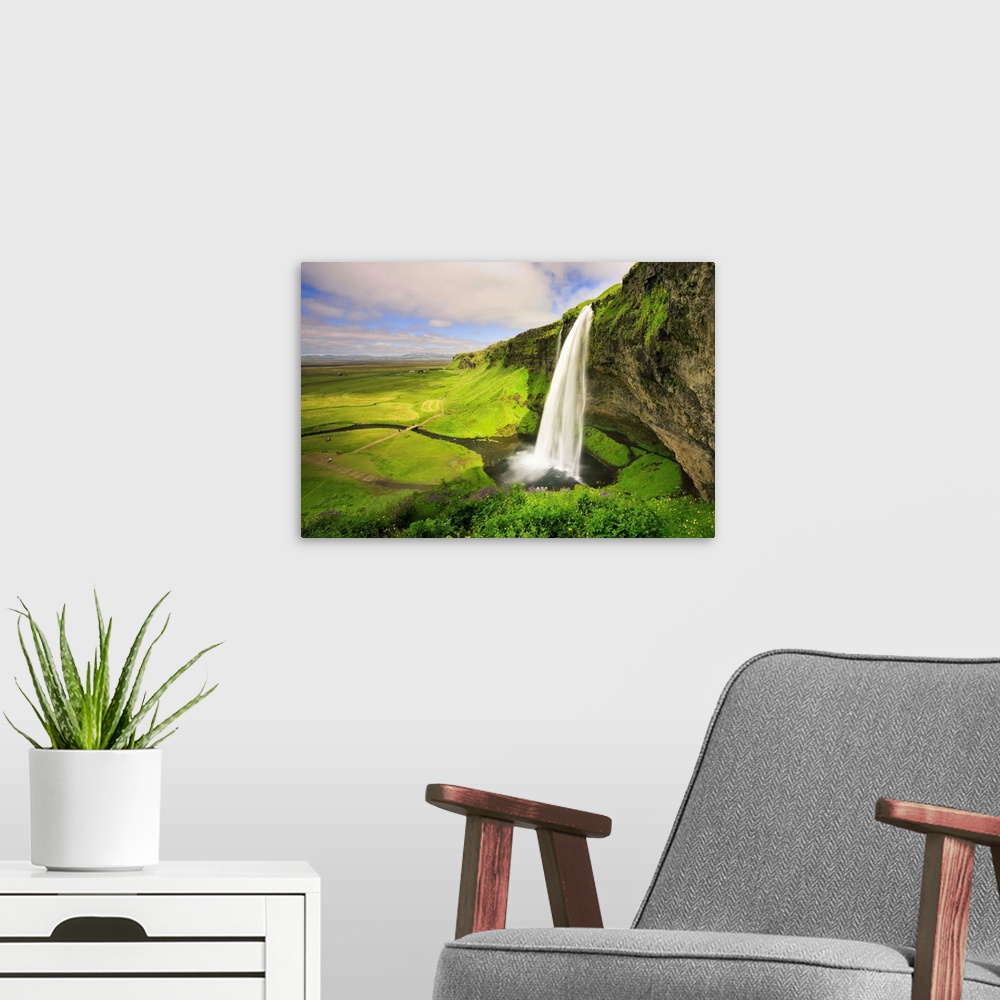 A modern room featuring Seljalandfoss Waterfall, South Coast, Iceland