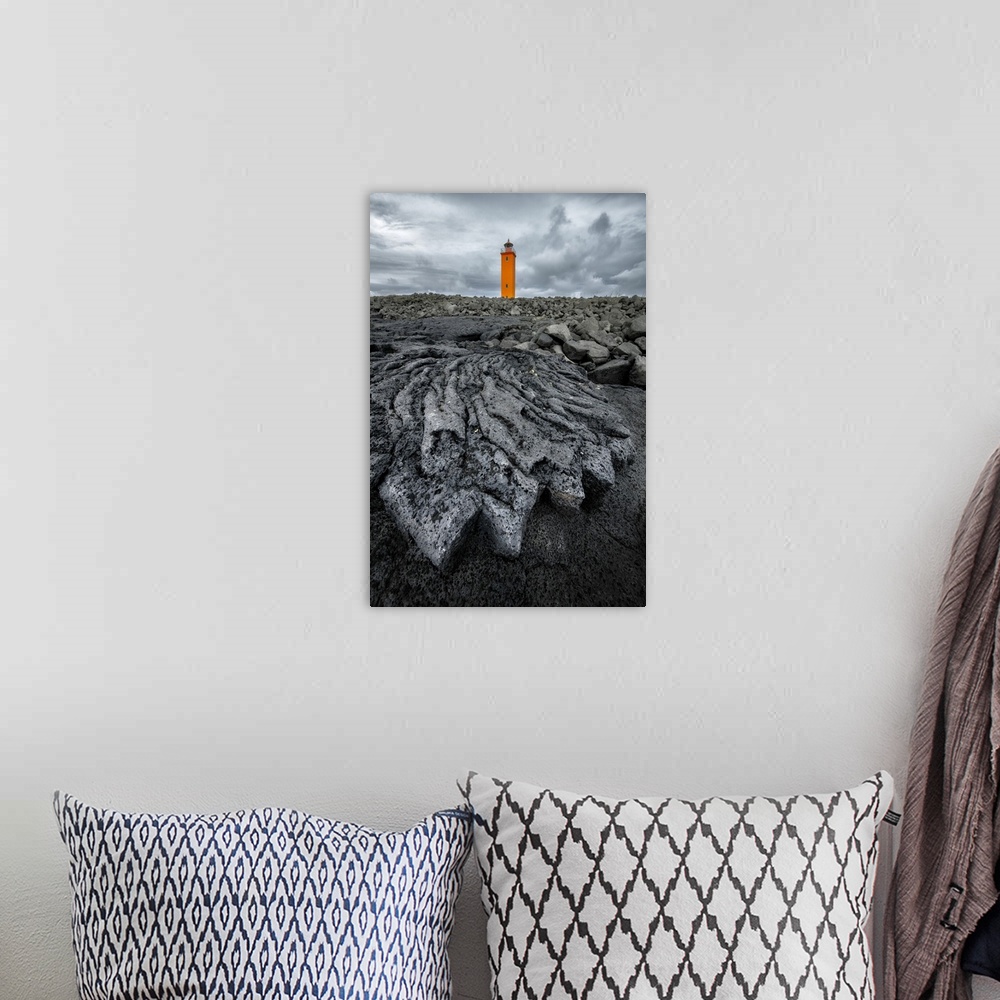 A bohemian room featuring Selvogsviti Lighthouse and ancient lava flow, Strandakirkja, Iceland