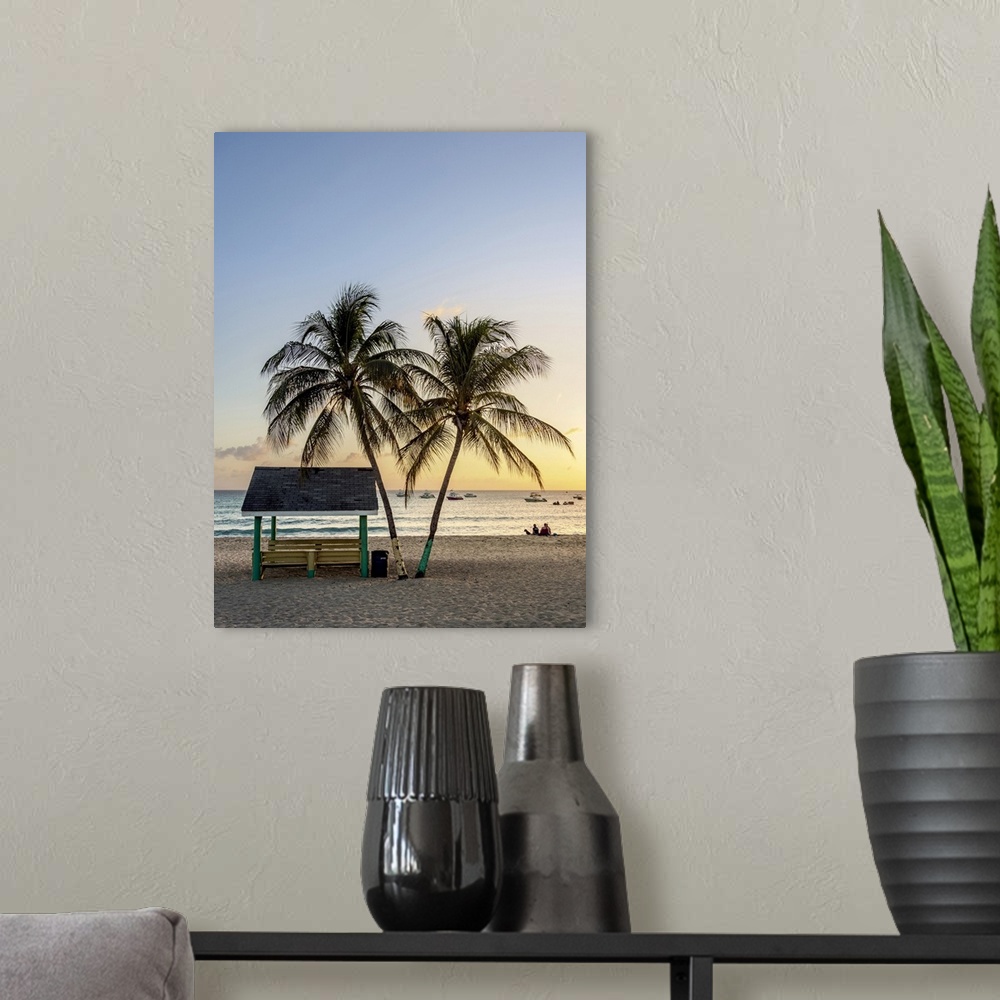 A modern room featuring Seven Mile Beach at sunset, West Bay, Grand Cayman, Cayman Islands