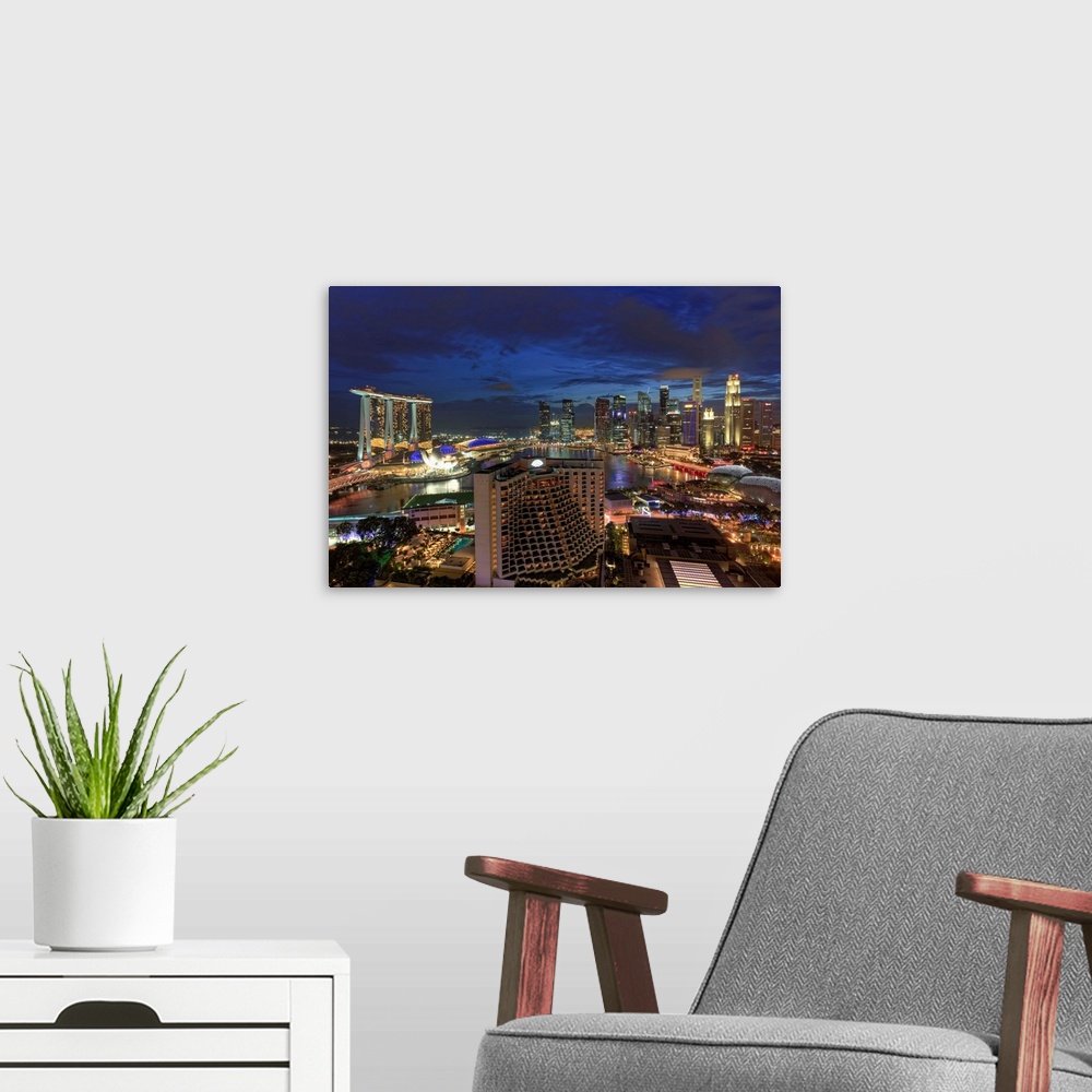 A modern room featuring Singapore, Aerial view of Singapore Skyline and Esplanade Theathre