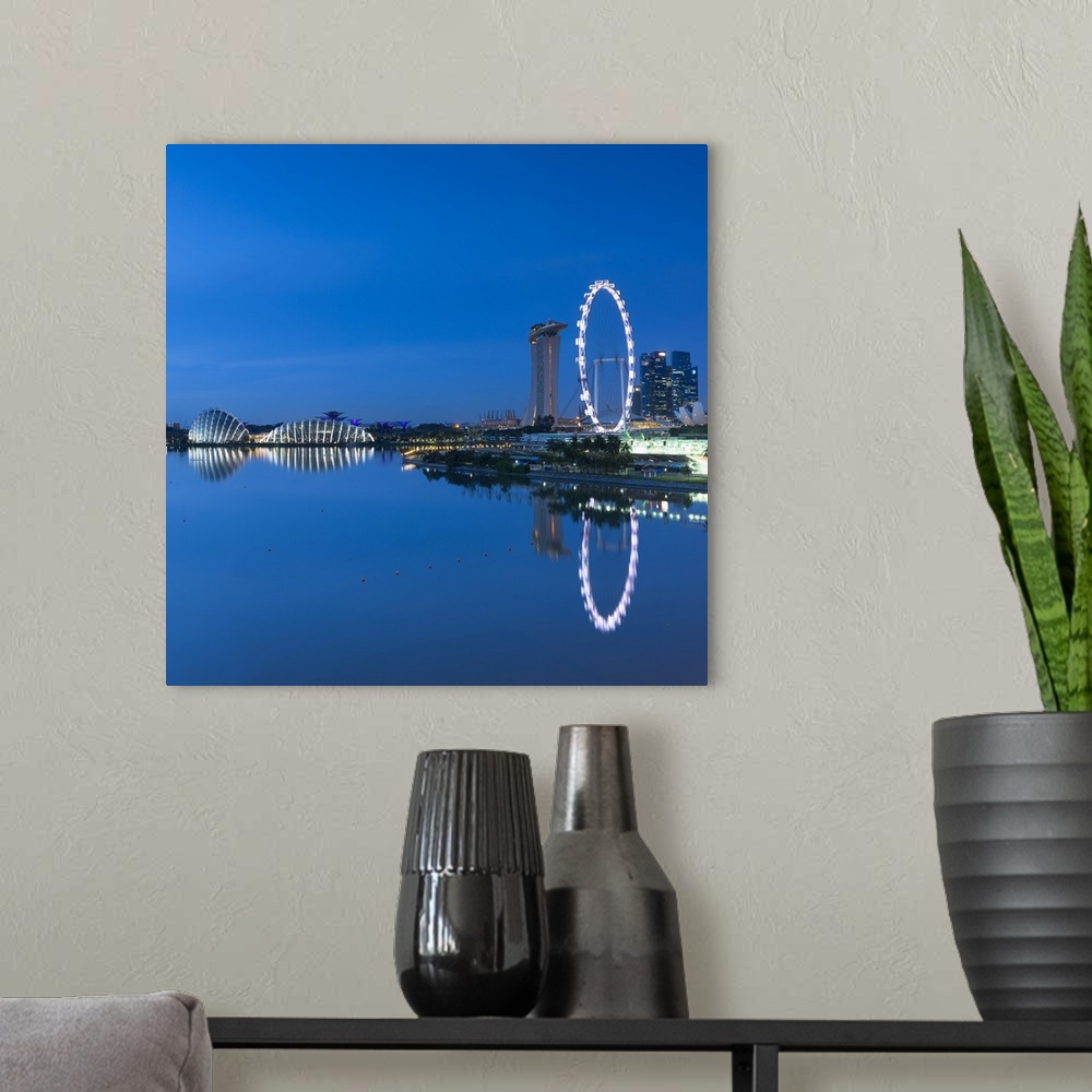A modern room featuring View of Singapore Flyer, Gardens by the Bay and Marina Bay Sands Hotel at dawn, Singapore.