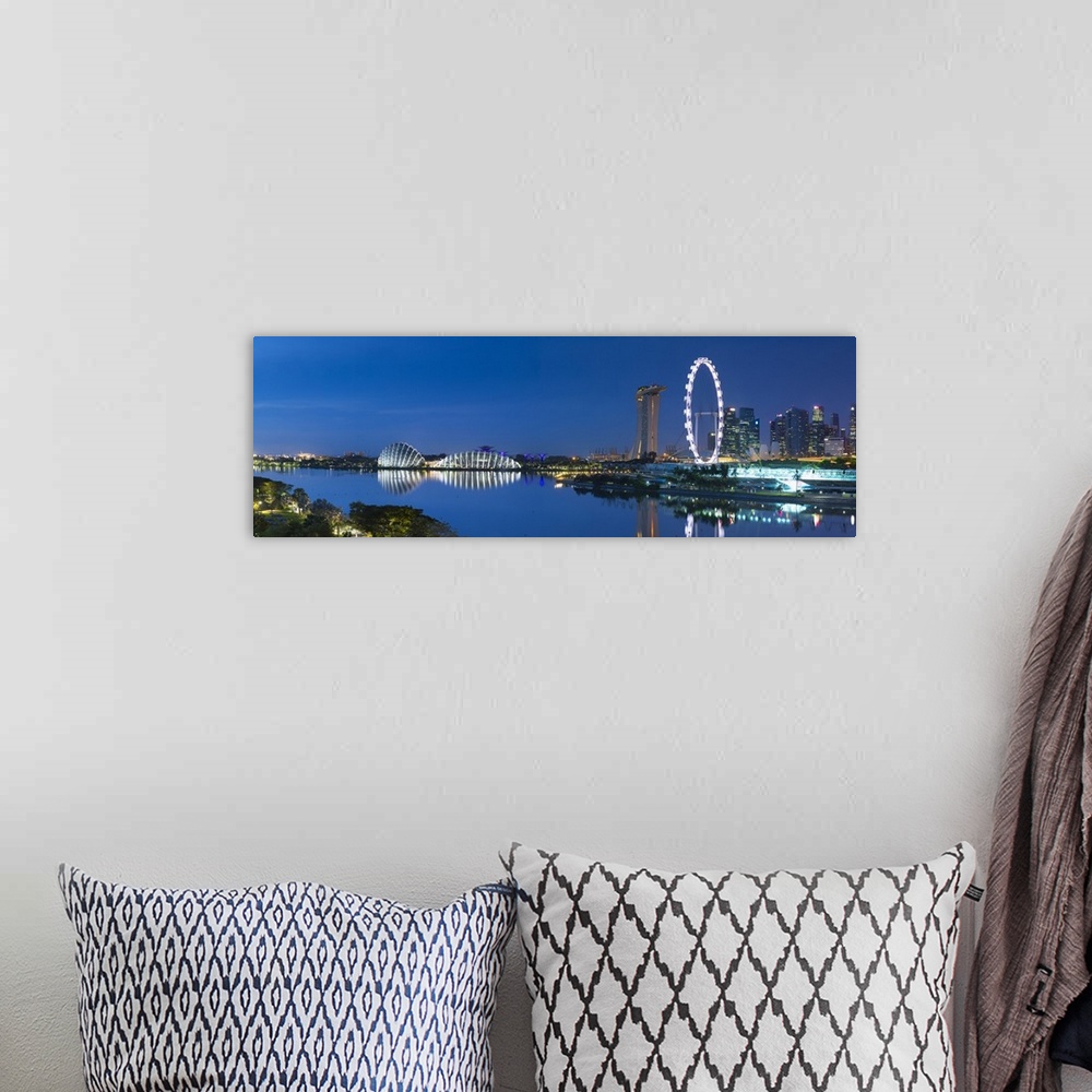 A bohemian room featuring View of Singapore Flyer, Gardens by the Bay and Marina Bay Sands Hotel at dawn, Singapore.