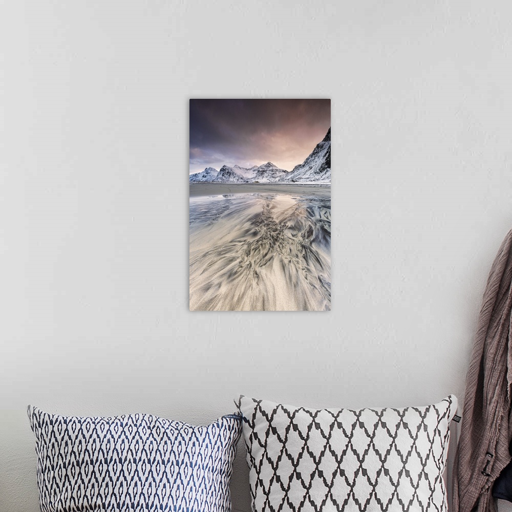A bohemian room featuring Pink sky on the surreal Skagsanden beach surrounded by snow covered mountains. Lofoten Islands No...