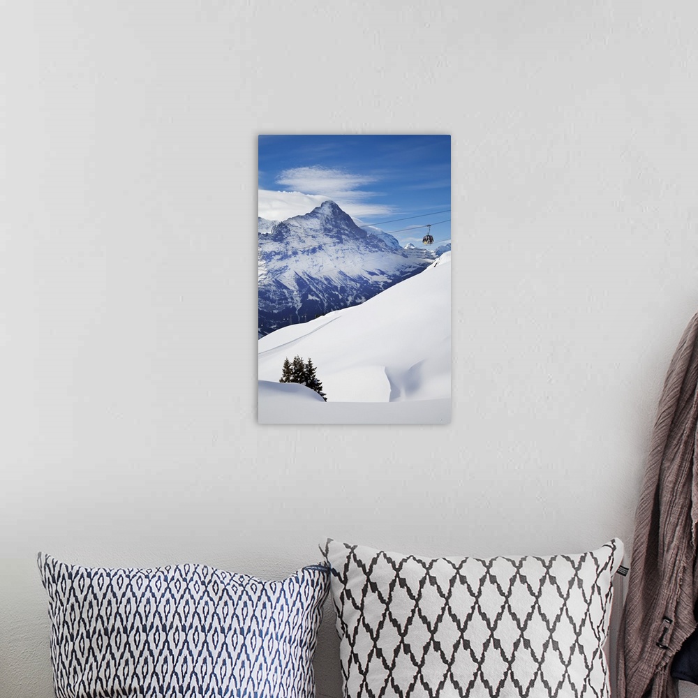 A bohemian room featuring Ski Gondola lift in front of the North face of the Eiger mountain, Grindelwald, Jungfrau region, ...