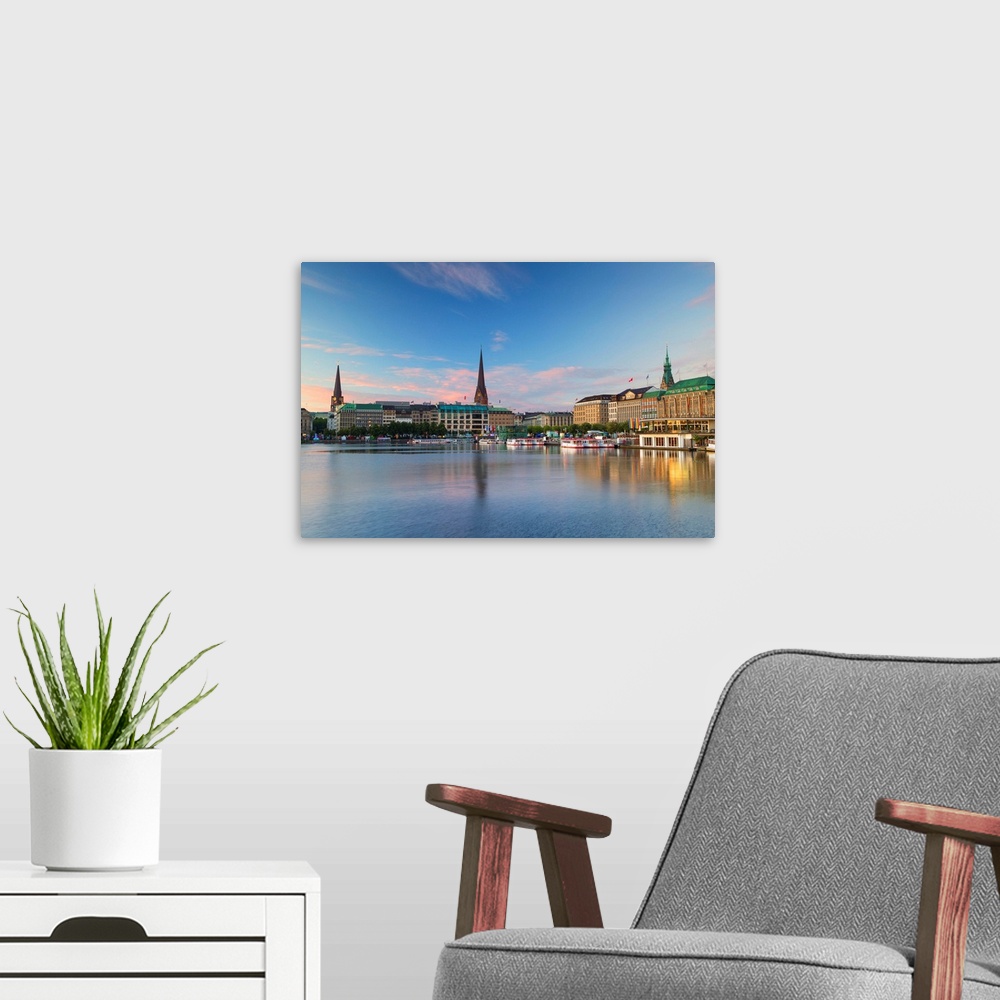 A modern room featuring Skyline of Binnenalster Lake at dawn, Hamburg, Germany.