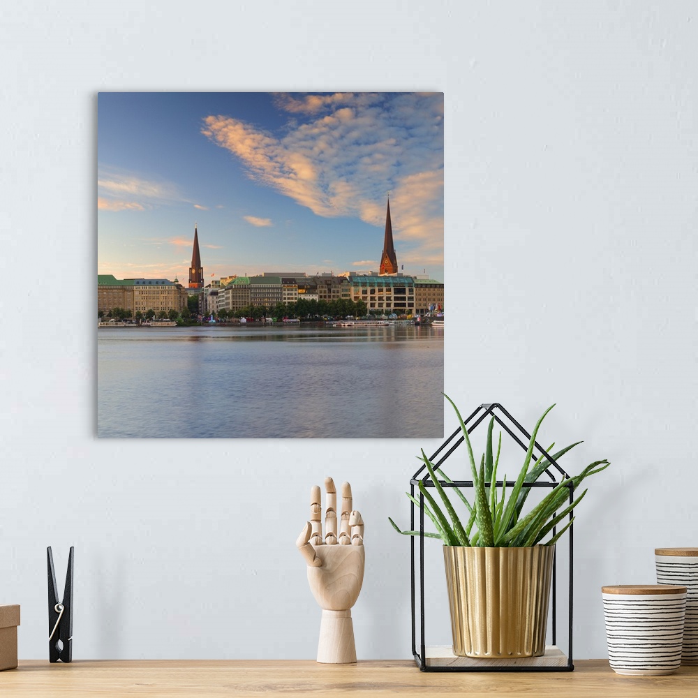 A bohemian room featuring Skyline of Binnenalster Lake at dawn, Hamburg, Germany.