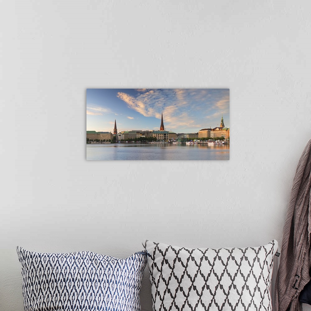 A bohemian room featuring Skyline of Binnenalster Lake at dawn, Hamburg, Germany.