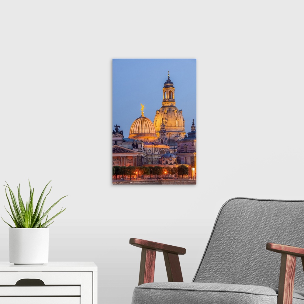 A modern room featuring Skyline of Dresden at dusk with Bruehl's Terrace ,Academy of Fine Arts, Church of Our Lady, Dresd...