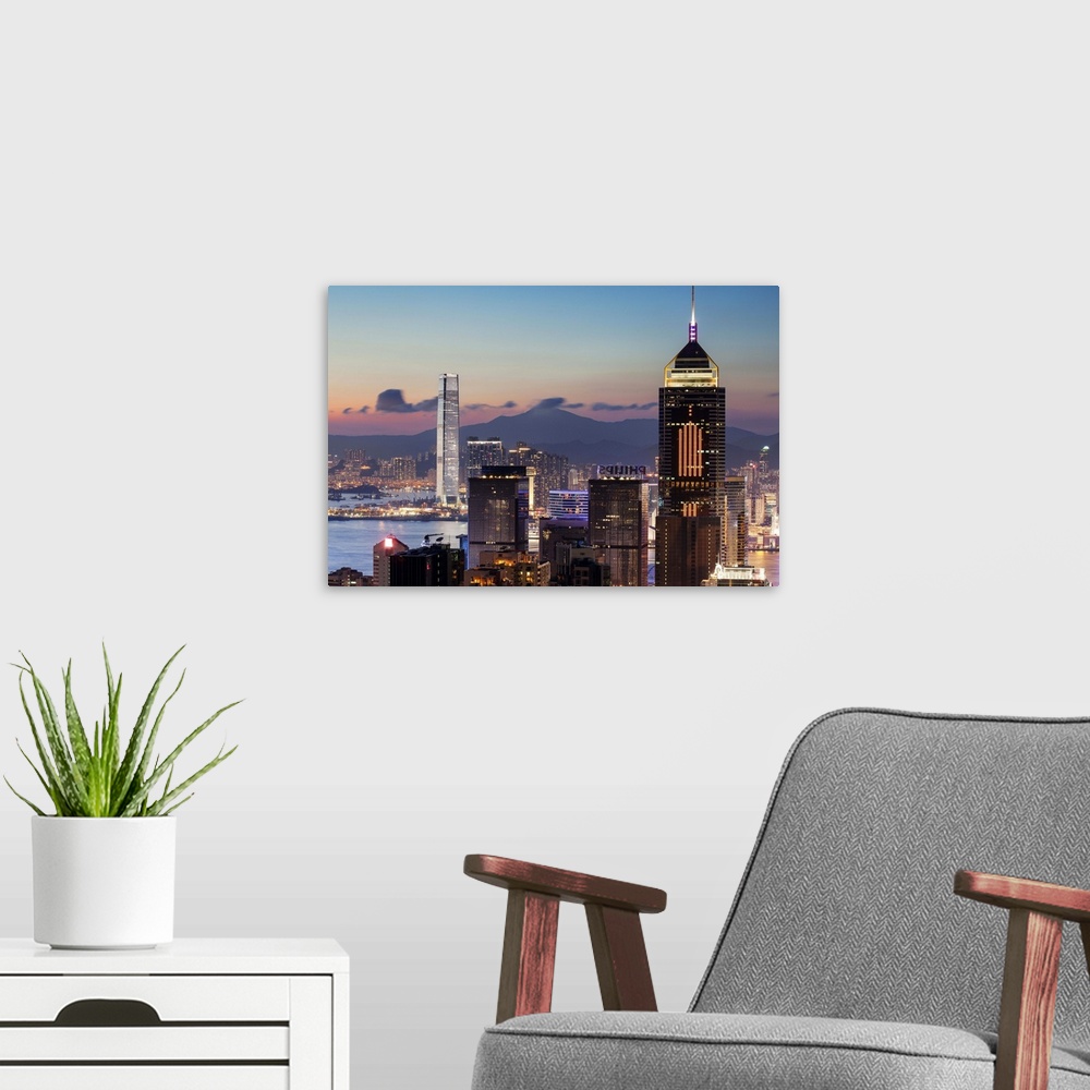 A modern room featuring Skyline of Hong Kong Island and Kowloon at sunset, Hong Kong