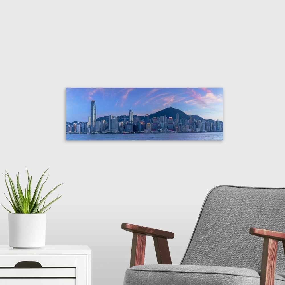 A modern room featuring Skyline of Hong Kong Island at sunset, Hong Kong