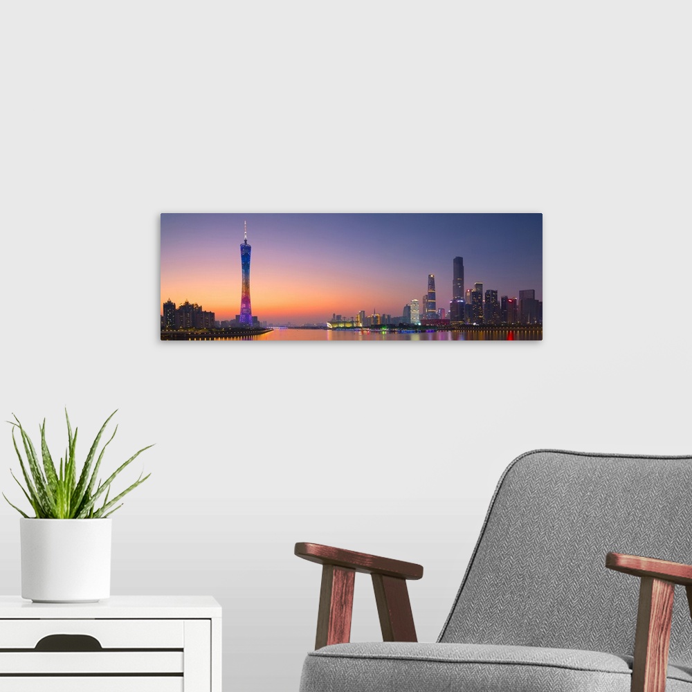A modern room featuring Skyline of Tianhe at sunset, Guangzhou, Guangdong, China.