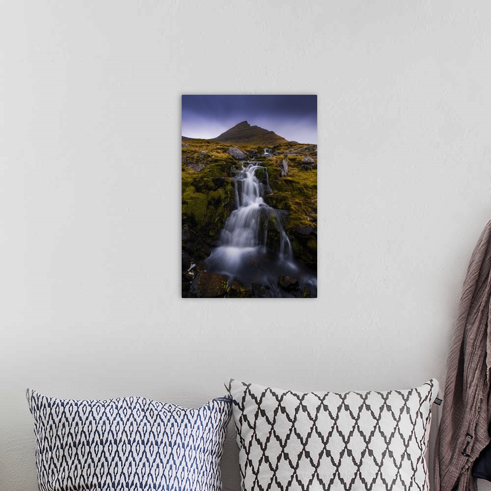 A bohemian room featuring Slaettaratindur mountain and waterfall near Gjogv, Sunda municipality, Eysturoy, Faroe Islands, D...